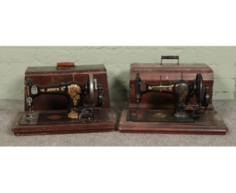 Two vintage wooden cased sewing machines, Jones and Sterling.  