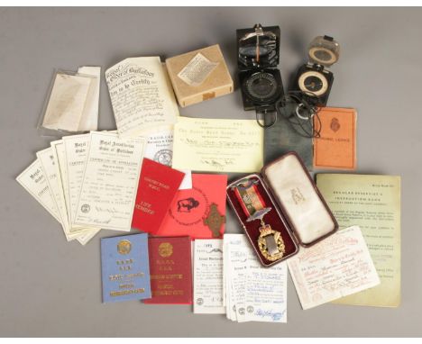 A quantity of collectables and ephemera. Includes Buffaloes certificates, membership cards, silver gilt medal etc. Two milita