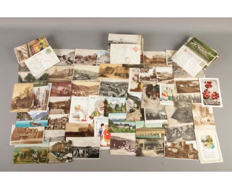 A collection of vintage postcards, to include Birthday wishes and Welsh examples, along with scenes from around the world.  