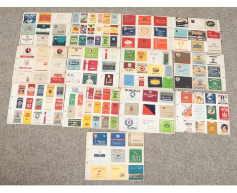 A large quantity of vintage cigarette packets mounted on card (double sided).  
