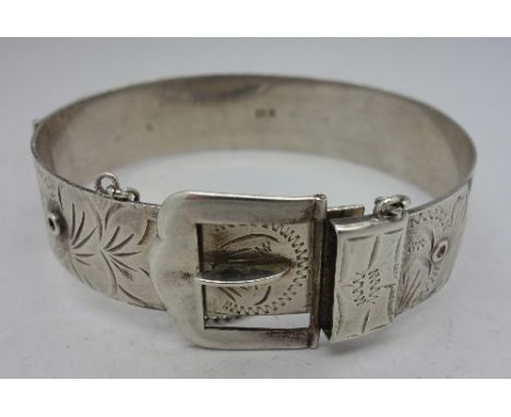 A silver buckle bangle