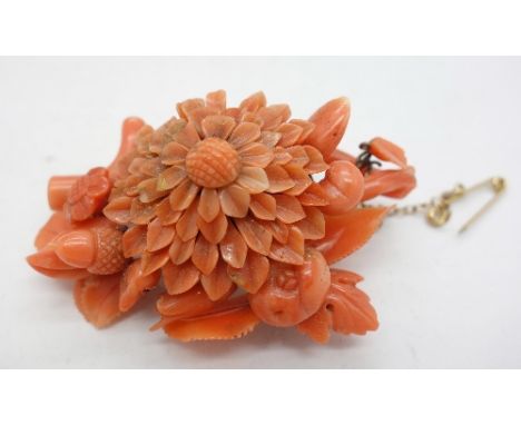 A Victorian yellow metal set coral brooch, repaired