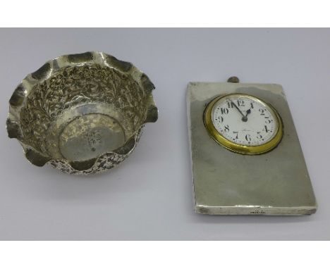 A silver framed desk clock, Birmingham 1912 and a white metal dish