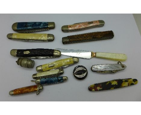 Eleven penknives and a Notts County Supporters Club enamel badge