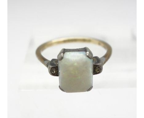 A 9ct gold, silver set opal ring, size L
