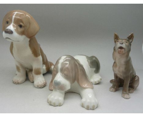 Two Royal Copenhagen dogs, 439 and 2197, and a Lladro dog