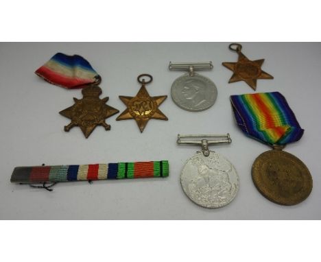 Whitmore family medals, a pair of WWI medals to T-1464 Pte.P.M. Whitmore The Queens R. and a group of WWII medals, unnamed bu
