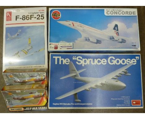 Five scale model plastic kits, all aircraft including Howard Hughes' The Spruce Goose and Concorde