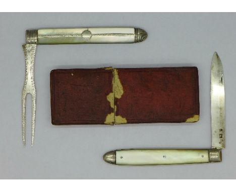 A Georgian silver and mother of pearl fruit knife, and a fork, a/f, with box