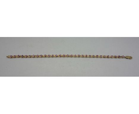 A 9ct gold and pink sapphire bracelet, weight 8.1g