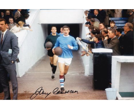 Autographed JOHNNY CROSSAN 12 x 8 photo : Col, depicting Manchester City captain JOHNNY CROSSAN leading his side out onto the