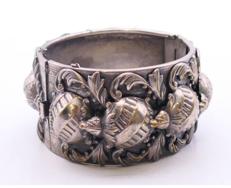 A Victorian silver plated bangle.  6 cm diameter, 21 cm circumference, 3.75 cm high. 