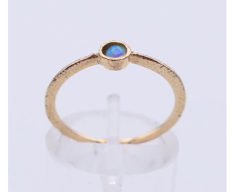 A 9 ct gold and opal ring. Ring size M/N.