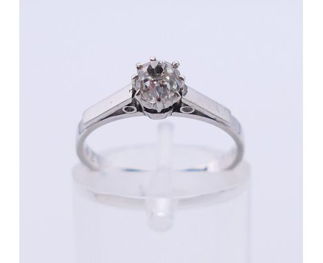 A platinum 0.5 carat diamond solitaire ring, stamped 'plat' and '52'. Ring size K.