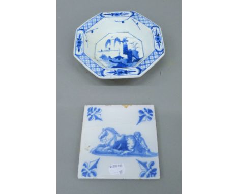 An 18th century blue and white porcelain Delft tile, man with horse and an unusual octagonal 18th century tin glaze blue and 