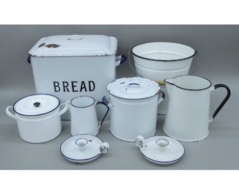 A quantity of enamel kitchenalia. The bread bin 37 cm high.