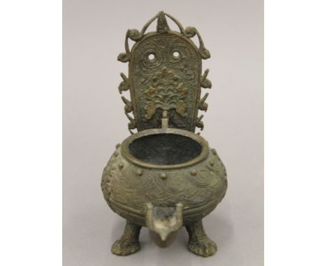 A 19th century Asian bronze censer/oil lamp on three paw feet. 15.5 cm high.