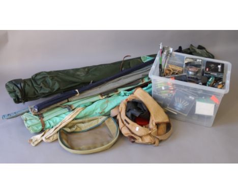 A quantity of various fishing tackle including reels, flies, bags and rods, including a Hardy's example. The longest rod bag 