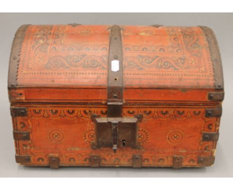 An 18th century Scandinavian painted wood trunk with domed lid, iron lock and strapwork. 32 cm high x 48 cm wide.