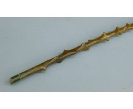 A Japanese bone inlaid and carved bamboo walking stick. 89 cm high.
