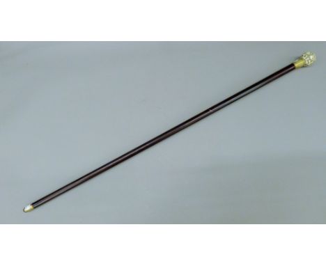 A walking stick, the handle formed as a bone globe compass. 92 cm long.