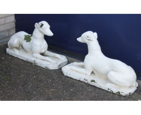 A pair of greyhound garden ornaments. Each 72 cm long.
