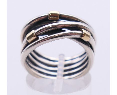 A Pandora 14 K gold and silver ring. Ring size N/O. 