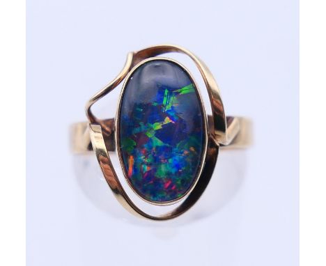 A 9 ct gold and opal ring. Ring size P/Q.
