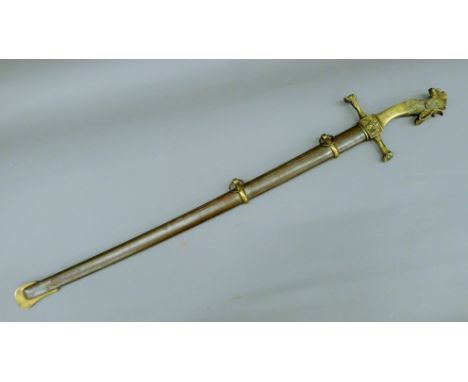 A 19th century French sword in scabbard, the grip formed as a cockerel. 99 cm long.