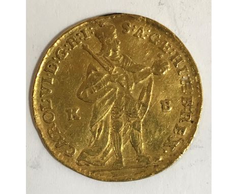 A HUNGARIAN GOLD DUCAT. Carol VI standing with sceptre and orb between K B, the obverse with Madonna and Child, dated 1737, 3