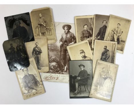 A COLLECTION OF PHOTOGRAPHS OF CONFEDERATE AND UNION ARMY SOLDIERS. A photograph of General John C. Fremont, standing with ha