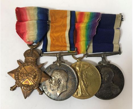 A GREAT WAR TRIO AND LONG SERVICE GROUP. A group of four comprising 1914-15 Star to J.17025 S.R. Gill, A.B. R.N. War Medal an