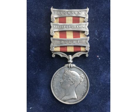 A TWO/THREE CLASP INDIAN MUTINY MEDAL TO AN ASS-SURGEON WITH THE 9th LANCERS. An Indian Mutiny medal with Delhi, Relief of Lu
