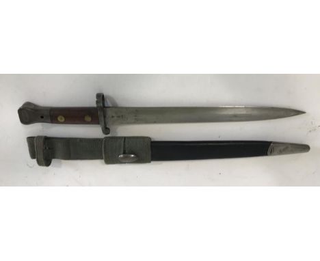 A BRITISH 1888 PATTERN BAYONET AND SCABBARD. A Victorian Lee Metford 1888 Pattern Bayonet MkII, with a 30.5cm double edged bl