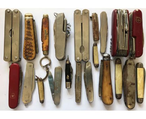 A COLLECTION OF THIRTY MODERN AND PART FOLDING KNIVES. A collection of varied knives and part knives to include Swiss Army ty