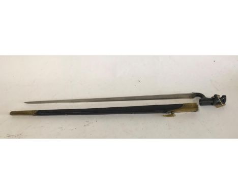 A VICTORIAN 1895 PATTERN SOCKET BAYONET AND SCABBARD. An 1895 Pattern Martini Enfield bayonet with a 54cm triform blade, in a