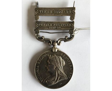 AN INDIA MEDAL NAMED TO THE SUSSEX REGIMENT. An India medal with Punjab Frontier 1897-98 and Tirah 1897-98 clasps, named to 4