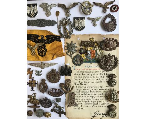 A COLLECTION OF MILITARY BADGES AND INSIGNIA. A large collection of military insignia and badges, British and German, Second 