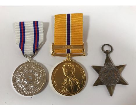 A SECOND WORLD WAR STAR AND TWO UNOFFICIAL MEDALS. A 1939-45 Star lacking ribbon and two recent unofficial medals: A Queen El