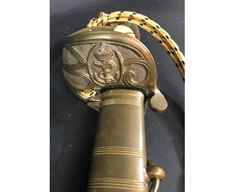 A BRITISH 1827 PATTERN NAVAL SWORD BY WILKINSON. An 1827 pattern Naval Officers Swird with wire and fish skin effect grip and