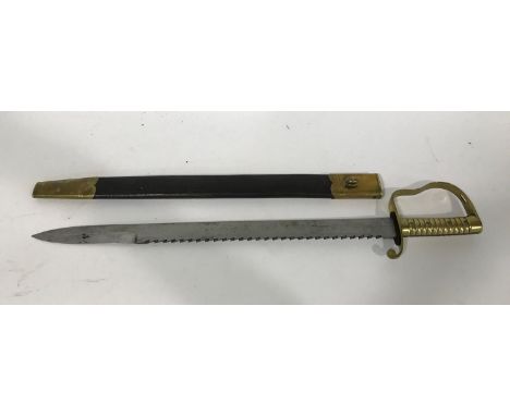 A WILKINS OF LONDON 1856 PATTERN PIONEER SWORD AND SCABBARD. The 57cm pointed blade with saw edge, stamped 'Wilkinson London'