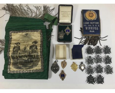 TWO EDWARDIAN GOLD SPORTING MEDALS AND OTHER ITEMS. A Hertfordshire Football Association 9ct Gold medal for 1908-09, another 