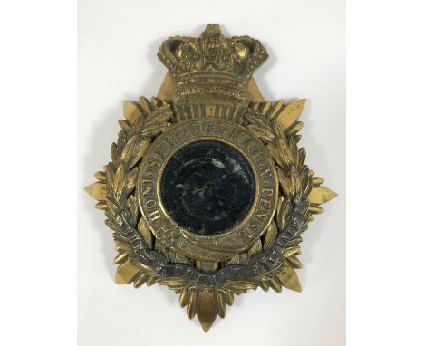 A DURHAM LIGHT INFANTRY HELMET PLATE. An officers Durham Light Infantry helmet plate with Victorian crown, lacking its centra