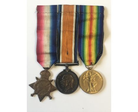 A FIRST WORLD WAR TRIO TO THE QUEEN'S REGIMENT. A group of three comprising 1914-15 Star named to T-2239 The Queen's Regiment