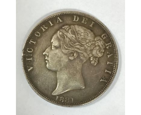 A VICTORIAN HALFCROWN. A Victorian Halfcrown, young head portrait, dated 1881.