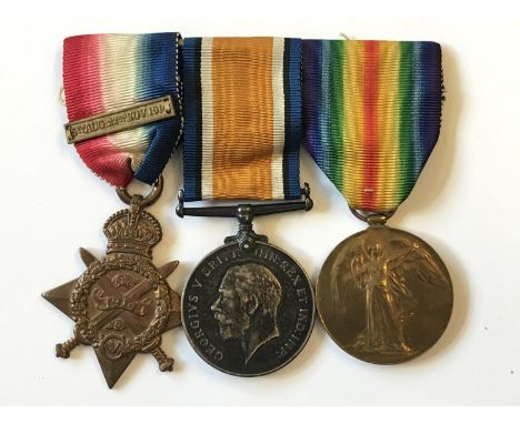 A FIRST WORLD WAR CASUALTY TRIO TO THE COLDSTREAM GUARDS. A group of three comprising 1914 Star with 3rd August 22nd November