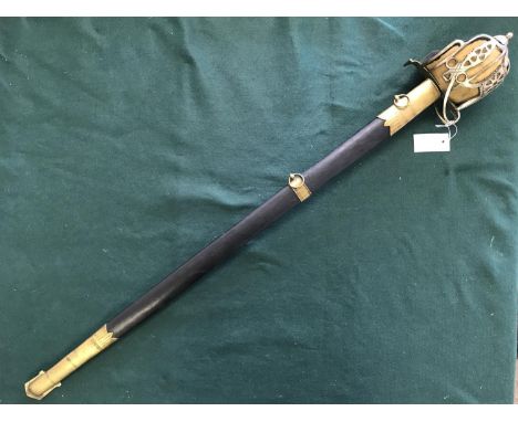 A REPLICA SCOTTISH INFANTRY OFFICERS BASKET HILT SWORD. A replica 1828 pattern broadsword with an 81 cm blade with etched dec