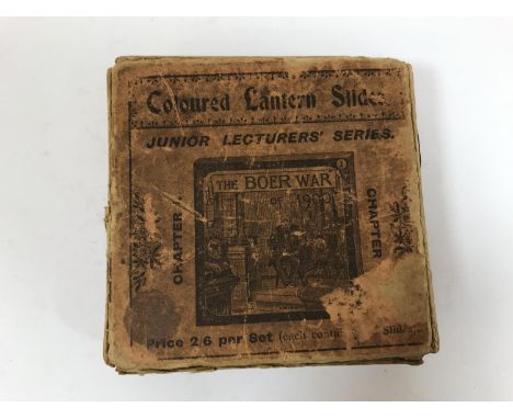 A SET OF COLOURED LANTERN SLIDES 'THE BOER WAR' A set of eight coloured magic lantern slides with lecture notes 'Lantern Lect