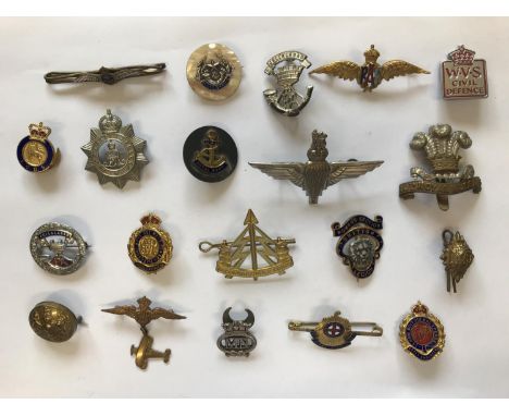 A COLLECTION OF MILITARY SWEETHEART BROOCHES AND UNIFORM BADGES. A collection of 61 assorted badges and brooches to include t