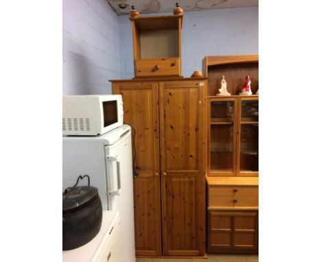 A pine double door wardrobe and bedside chest